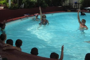 Ms Carolyn teaching backstroke